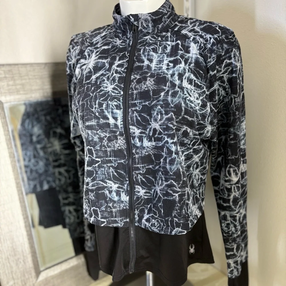 Spyder Black and White Running Jacket with layered Athletic Silhouette